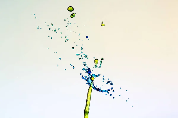 Fondo abstracto de salpicadura de agua con pinturas, colisión de gotas — Foto de Stock