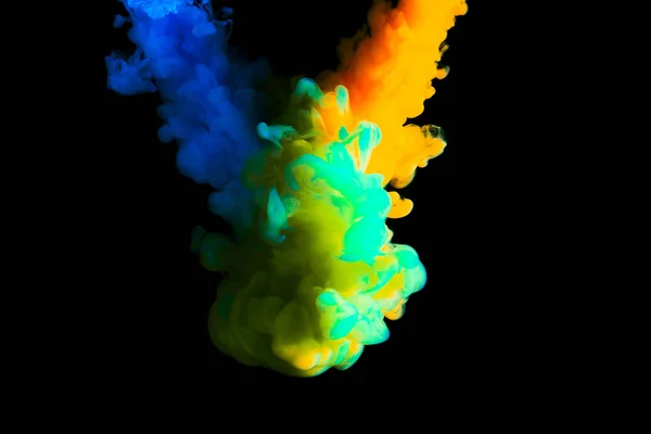 Festék felhő vízben, absztrakt háttér, folyamata keverés sokszínű festéket egy fekete háttér — Stock Fotó
