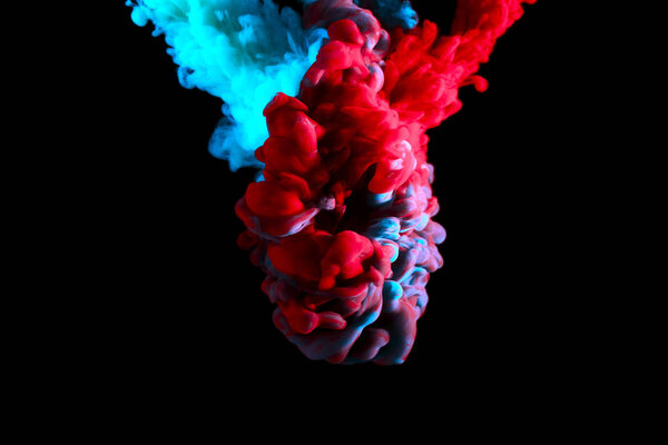 paint stream in water, interlacing of two colors forming a new hue in cloud in water , abstract background, multicolored dye on a black background