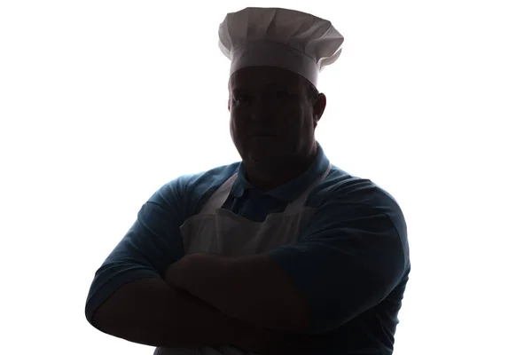 Силуэт портрет добродушного человека в плите, повар складывает руки на груди на белом изолированном фоне — стоковое фото