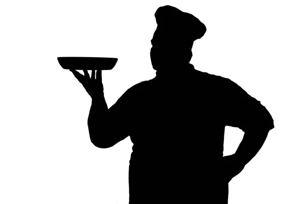 Silhouet van een pot-bellied Chief-Cooker met de schotel aan de klant op een witte geïsoleerde achtergrond — Stockfoto