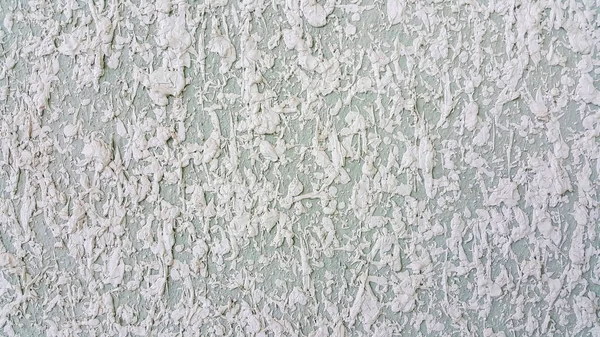 壁のファサードは乳剤混合物からの薄い青と白の凸スプレーです — ストック写真