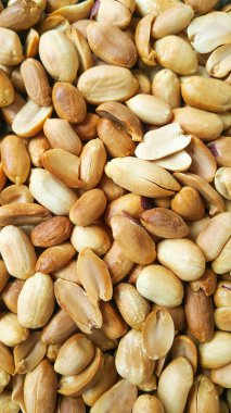 Soyulmuş fıstıkların arka planı. Derisi olmayan fıstıklı fıstık. Açık bir fotoğraf..