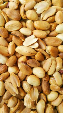 Soyulmuş fıstıkların arka planı. Derisi olmayan fıstıklı fıstık. Açık bir fotoğraf..