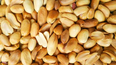 Soyulmuş fıstıkların arka planı. Derisi olmayan fıstıklı fıstık. Açık bir fotoğraf..