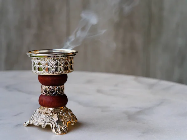 Ornate Arabian Bakhoor Incense Burner Censer Emitting White Smoke Copy Stock Photo