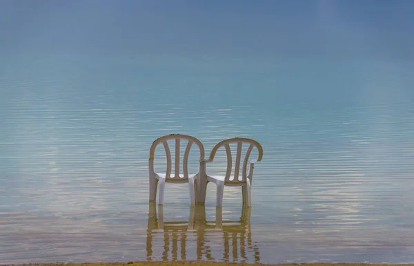 Chairs at the beach in the Dead sea resort, Israel