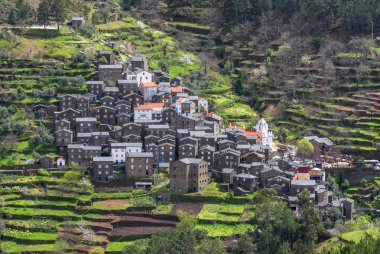 Traditional schist houses of the old village of Piodao, Portugal clipart