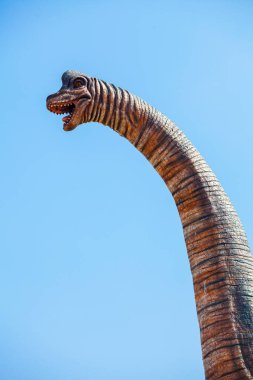Nong Nooch Bahçesi, PATTAYA, THAILAND - 1 Nisan 2020 Dinozor Vadisi mi? Nong Nooch Tropik Botanik Bahçesi, Pattaya, Tayland. Compsognathus