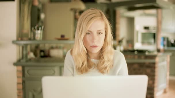 Young Blond Woman Sitting Table Home Looking Her Laptop Side — Stock Video