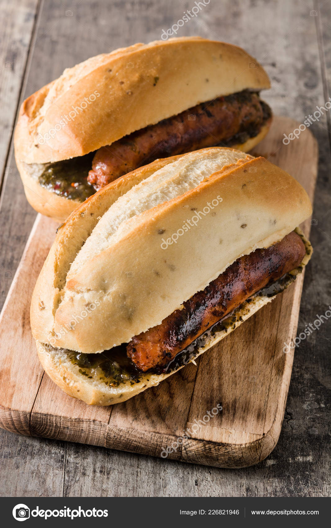Choripan Traditional Argentina Sandwich Chorizo Chimichurri Sauce Wooden Table Stock Photo by
