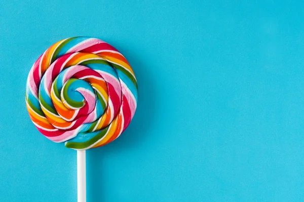 Colorful Lollipop Blue Background Top View Copyspace — Stock Photo, Image