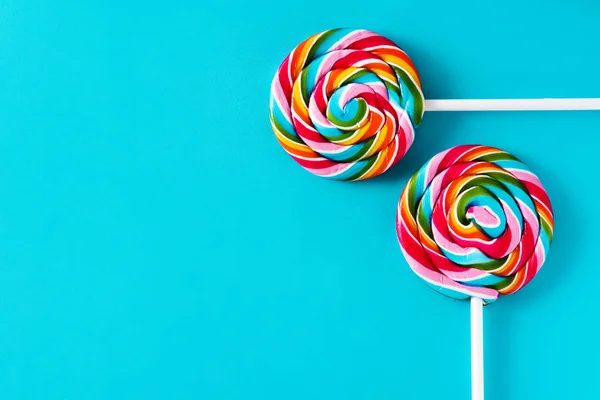 Colorful Lollipops Blue Background Copyspace — Stock Photo, Image