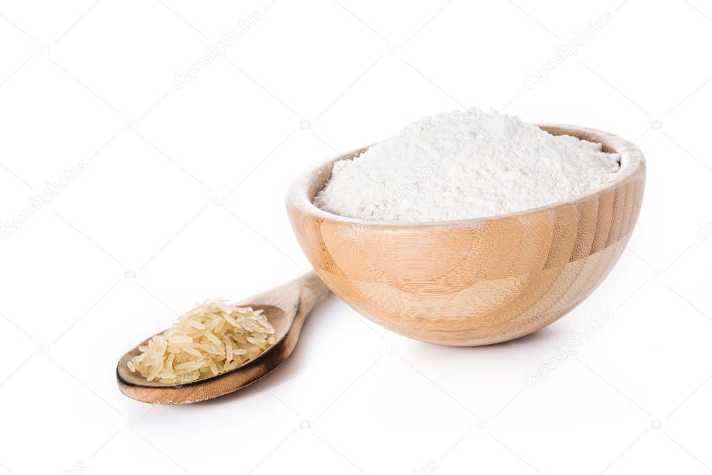 White rice flour in a bowl isolated on white background. 