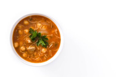 Harira soup in bowl isolated on white background. Typical Moroccan food. Ramadan concept. Top view. Copyspace