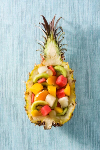 Mix fruit served inside pineapple