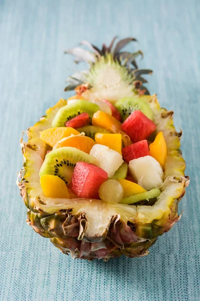 Mix fruit served inside pineapple