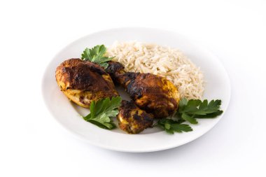 Roasted tandoori chicken with basmati rice in plate isolated on white background.