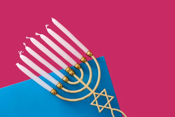 Менора Єврейської Хануки Рожевому Синьому Тлі — стокове фото