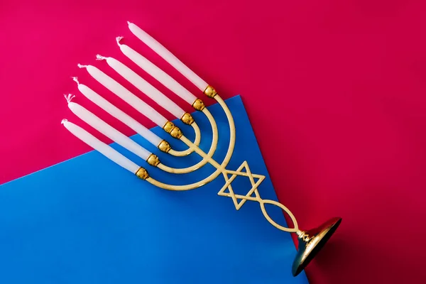 Менора Єврейської Хануки Рожевому Синьому Тлі — стокове фото