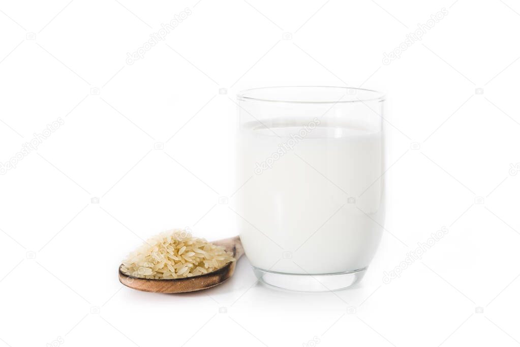 Rice milk in glass isolated on white background