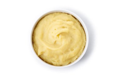 Basit bir seramik kasede servis edilen kremalı patates püresi. Klasik ev yapımı meze, beyaz arka planda izole edilmiş, yemek ve tatil stoku fotoğrafçılığı için mükemmel..