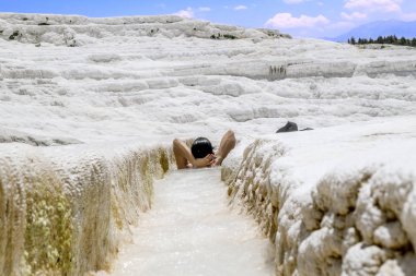 Pamukkale. Turkey.June 7, 2018.Tourists beyaz