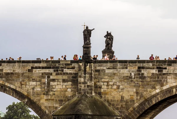 Sculpture of John the Baptist on Charles bridge in Prague. — Stock Photo, Image