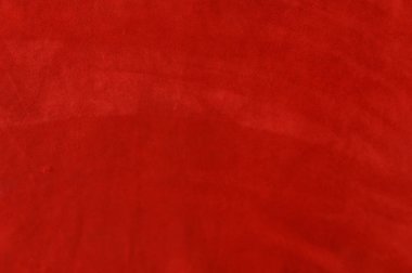 Süet kumaş Koyu kırmızı mat arka plan, closeup. Dikişsiz şarap deri Kadife doku.