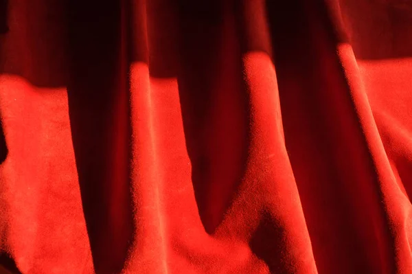 Dark red matte background of suede fabric, closeup. Velvet texture of seamless wine leather. — Stock Photo, Image