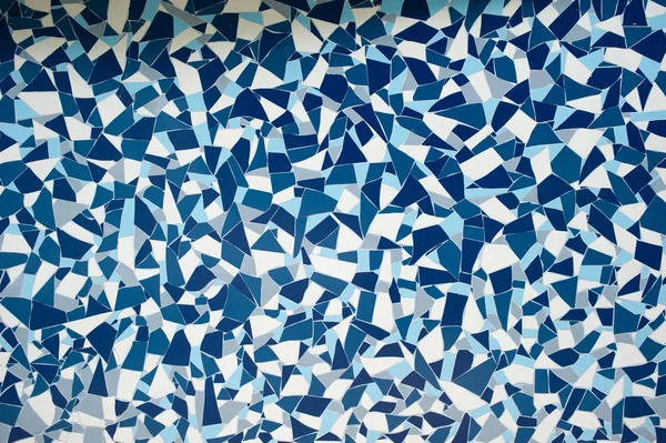 Piedra de roca azulejo de decoración de simetría pintado azul con grietas textura de fondo de pared — Foto de Stock