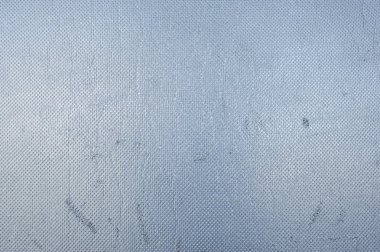 Gri arka plan. parlak şeyler. Duvar. Metal plakalar.