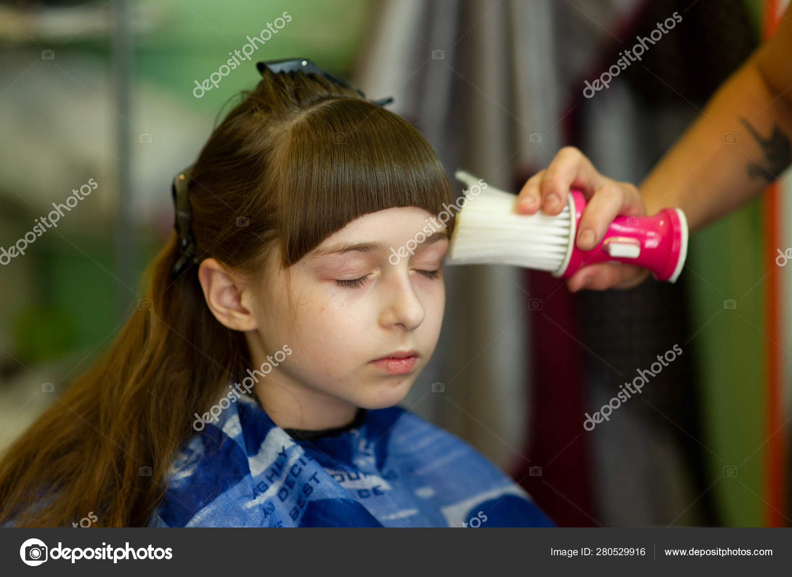 Hairdresser Making A Hair Style To Cute Little Girl Stock Photo