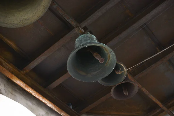 Wind-bell with metal fish at the traditional temple. wind-shaking wind chime. Bells in the temple