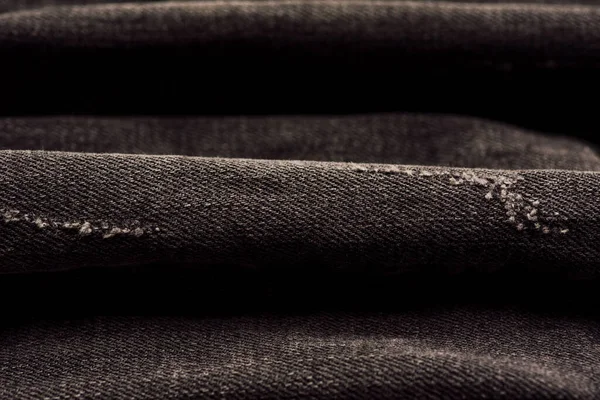 黑色斜纹棉织物质地 织物图案纹理的牛仔或黑色牛仔裤为设计抽象背景 黑色牛仔裤斜纹棉布碎片作为背景纹理组合 — 图库照片