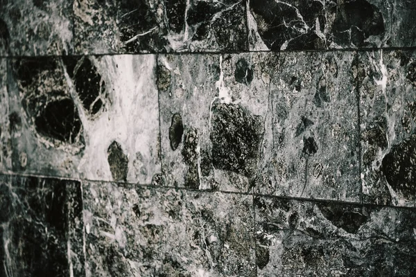 Marble Pattern. Close-up of marble tile. Black marble patterned texture background. Marble for design.