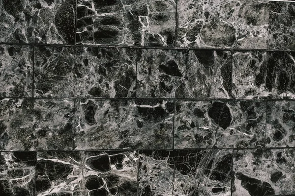 Marble Pattern. Close-up of marble tile. Black marble patterned texture background. Marble for design.