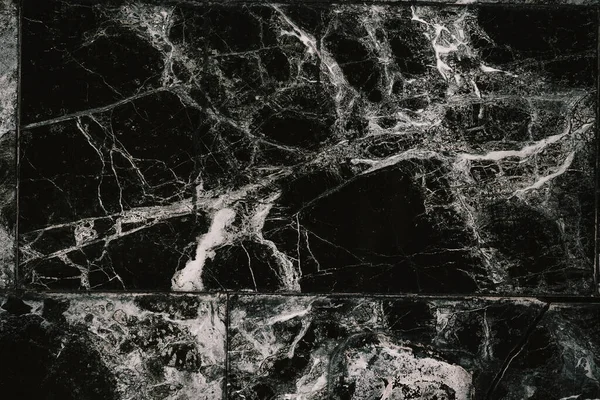 Marble Pattern. Close-up of marble tile. Black marble patterned texture background. Marble for design.
