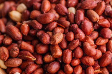 Yukarıdan bakan fıstıklar. Fıstık. Vejetaryen protein kaynağı Kızarmış fıstık arka planı