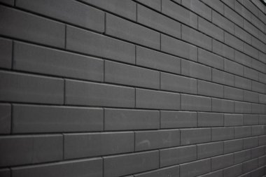 Siyah tuğla duvar. Kentsel siyah tuğla duvar dokusu duvarcılık arka planı.