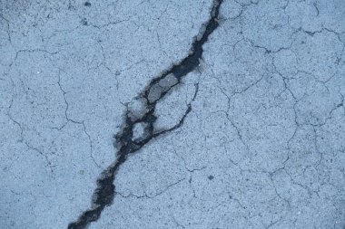 Los Angeles sokaklarında betonda çatlak. İç tasarım için arka plan.