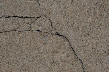 Los Angeles sokaklarında betonda çatlak. İç tasarım için arka plan.