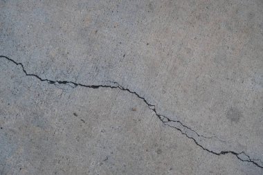 Los Angeles sokaklarında betonda çatlak. İç tasarım için arka plan.