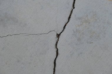 Los Angeles sokaklarında betonda çatlak. İç tasarım için arka plan.