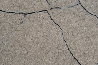 Los Angeles sokaklarında betonda çatlak. İç tasarım için arka plan.