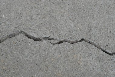Los Angeles sokaklarında betonda çatlak. İç tasarım için arka plan.