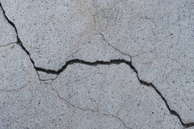 Los Angeles sokaklarında betonda çatlak. İç tasarım için arka plan.