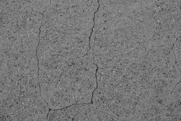 Crack in concrete on the streets of Los Angeles. Background for interior design.