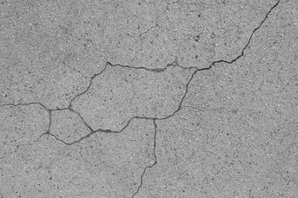 Crack in concrete on the streets of Los Angeles. Background for interior design.