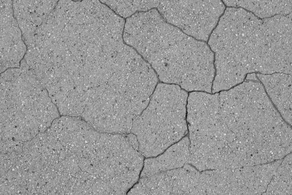 Crack in concrete on the streets of Los Angeles. Background for interior design.